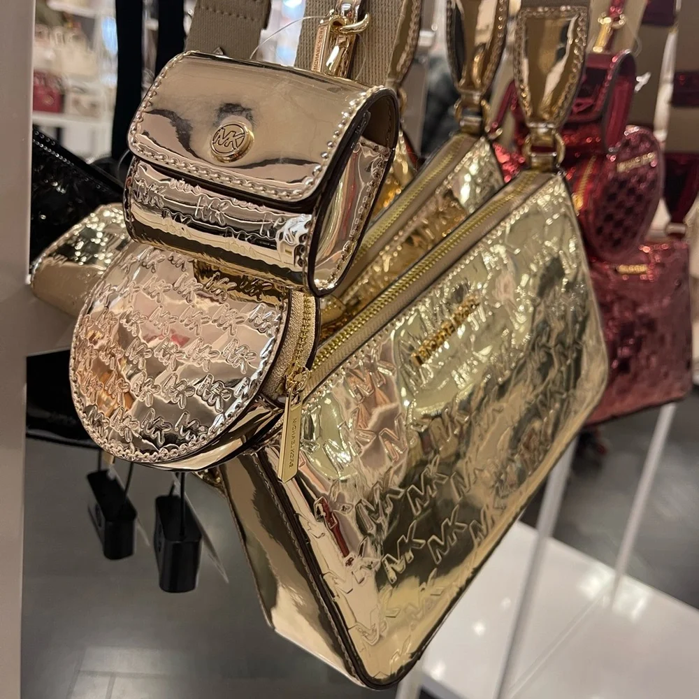 MICHAEL KORS Jet Set Sm Patent Logo Debossed Crossbody Apple Airpods
XBody Tech - Picture 10 of 12